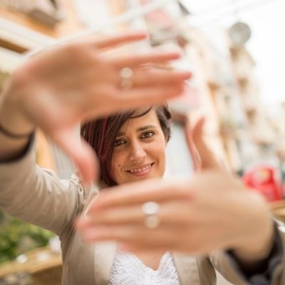 Woman creating frame with hands