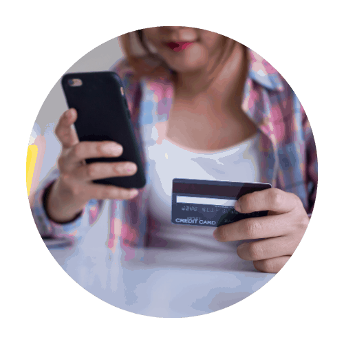 Woman with phone and credit card